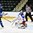 GRAND FORKS, NORTH DAKOTA - APRIL 21: Finland's Eetu Tuulola #19 with a scoring chance against Russia's Danil Tarasov #1 during quarterfinal round action at the 2016 IIHF Ice Hockey U18 World Championship. (Photo by Minas Panagiotakis/HHOF-IIHF Images)

